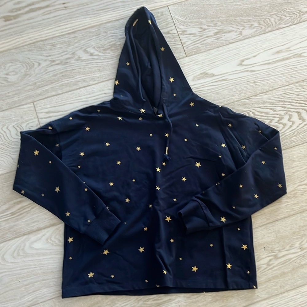 Alya size small navy with gol stars hoodie.